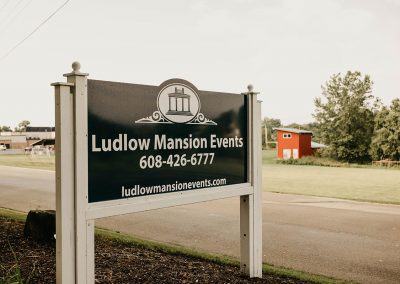 Ludlow Mansion events sign on roadside