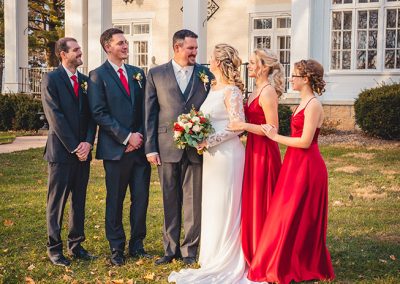 red white bridal party Ludlow Mansion grounds