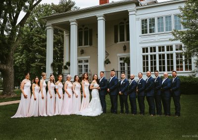 bridesmaids groomsmen pose line